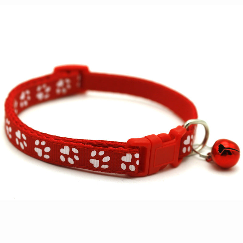Collier chien motif pattes rouge