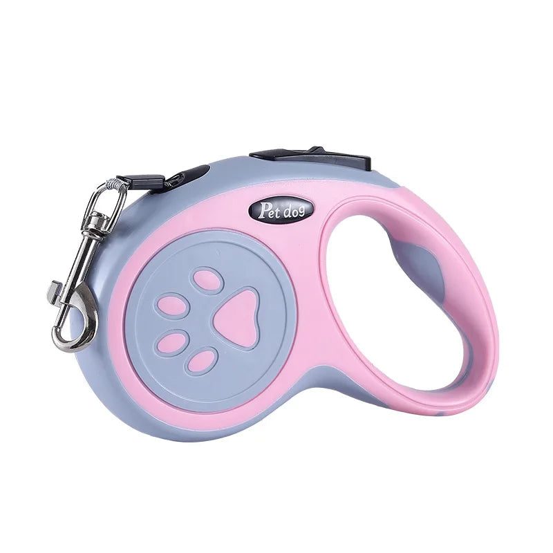 Laisse chien rétractable patte rose